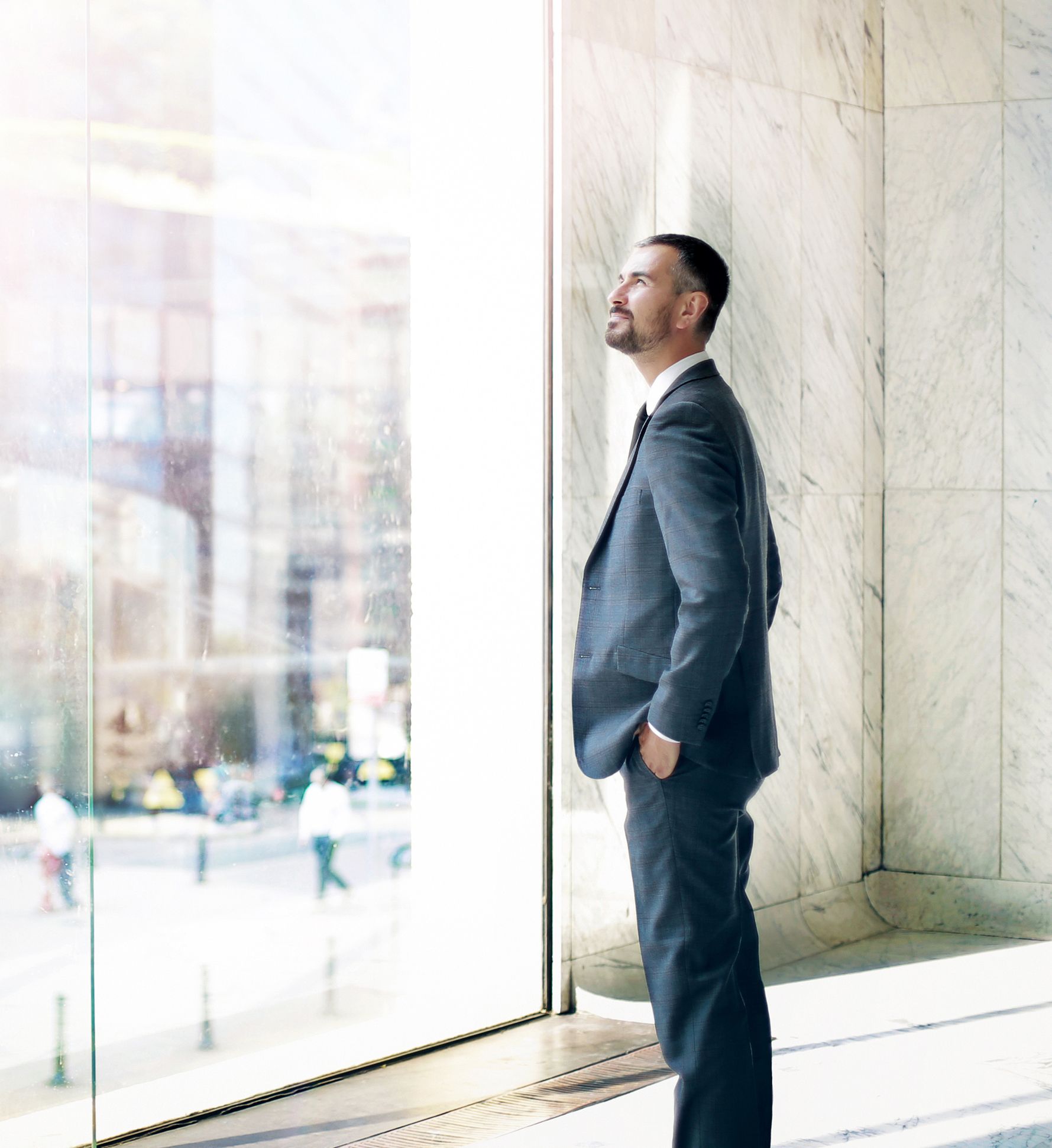 Picture of a man looking at the window